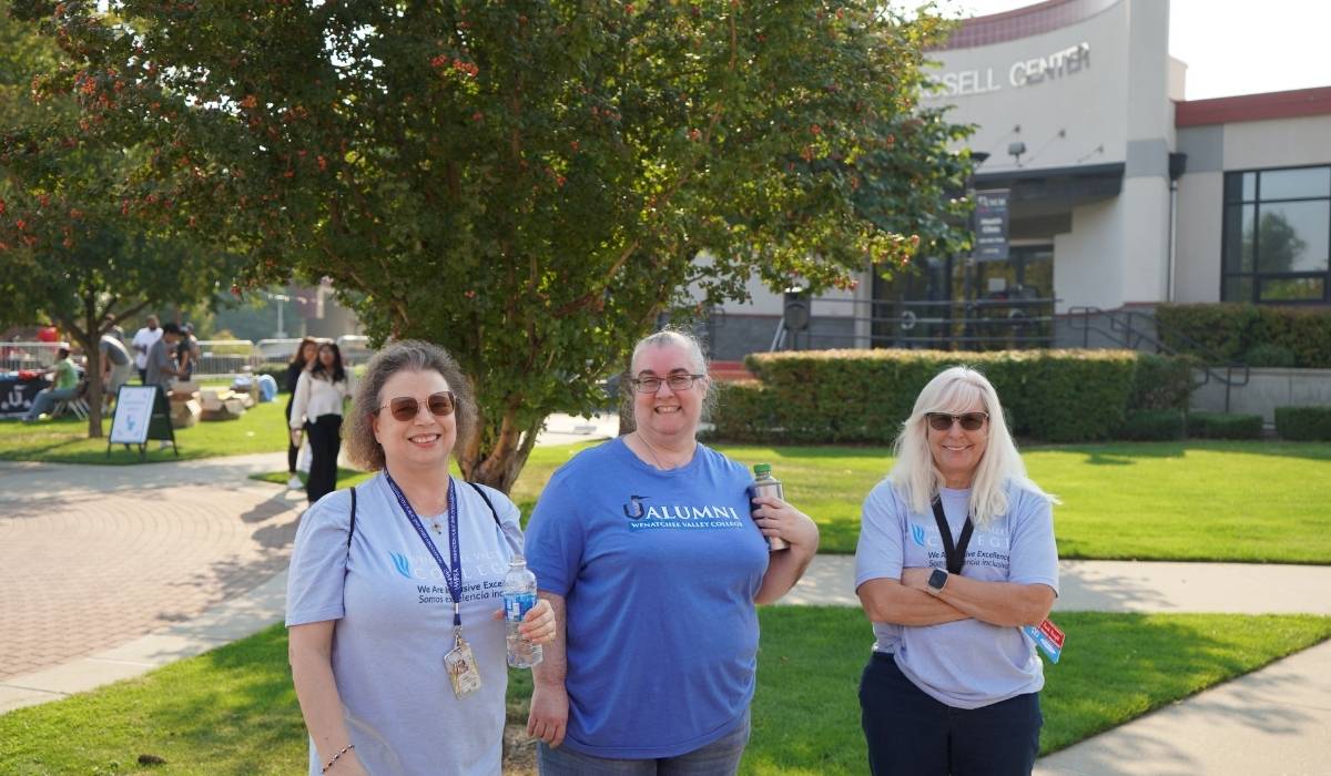 Three WVC staff members pose during the Food Truck Knight 2025 event