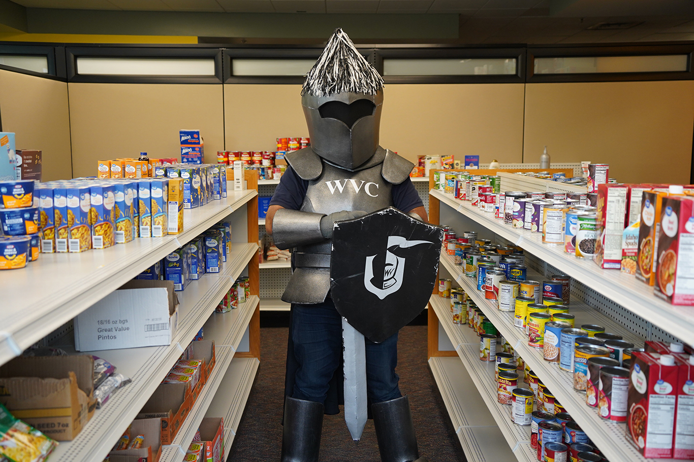 Knights Mascot in food pantry